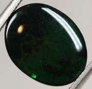 Liquid luster 1.73ct vibrant flashing black opal