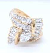 Dazzling Yellow Gold Marquois, Round and Baguette Diamond Ring