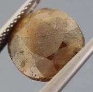 UNTREATED! Shimmering 9.10ct earth toned faceted Sapphire