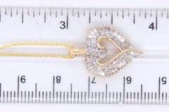 Attractive Yellow Gold Round Brilliant Cut and Baguette Open Diamond Heart Pendant on Chain