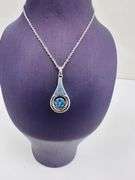 Platinum over 925 non tarnish Sterling silver with large fancy blue pendant