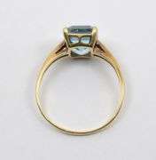 Tasteful Blue Topaz Solitaire