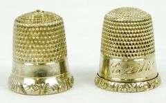 2 Antique Sterling Silver Thimbles