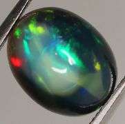 Fiery flashing 1.96ct Ethiopian bi-color Opal