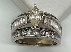 14K WHITE GOLD AND DIAMOND ENGAGEMENT RING WITH OVER 2.00 CARATS OF DIAMONDS.