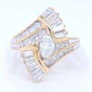 Dazzling Yellow Gold Marquois, Round and Baguette Diamond Ring