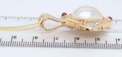 Wonderful Yellow Gold oval Mabe Pearl Enhancer with Ruby Cab and Diamond accents Necklace