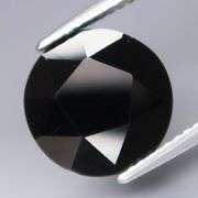 Elegant 3.82ct silky black Loas Tektite