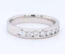 Sparkling Platinum Channel Set Diamond Band