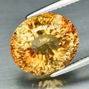 Fiery flashing 8.23ct golden Imperial Topaz