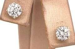 1.46 CARAT DIAMOND STUDS CRAFTED IN 14K YELLOW GOLD