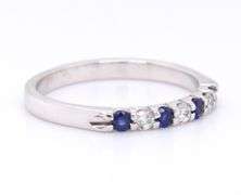 Attractive White Gold Blue Sapphire and Diamond Accent Band