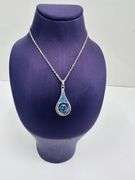Platinum over 925 non tarnish Sterling silver with large fancy blue pendant