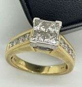 14K YELLOW GOLD AND DIAMOND RING.