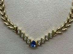 CERTIFIED BRAND NEW 14K GOLD , DIAMOND AND TANZANITE NECKLACE