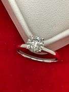 CERTIFIED  BRAND NEW 14K WHITE GOLD AND DIAMOND SOLITAIRE RING