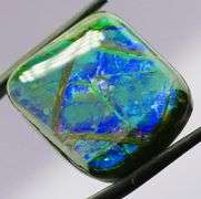 Look at this 36.18ct dragonfly wing patterned Ammolite!