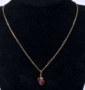 Angelic Ruby Heart Necklace In Yellow Gold