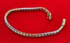 CERTIFIED 14K WHITE AND YELLOW GOLD DIAMOND TENNIS BRACELET. 1.25 CARAT