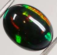Captivating 2.04ct block flashing Black Opal