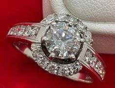 CERTIFIED LADIES 18K WHITE GOLD AND DIAMOND RING