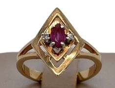14K GOLD RING WITH DIAMONDS AND TOURMALINE