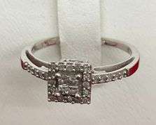 LADIES 10K WHITE GOLD AND DIAMOND RING