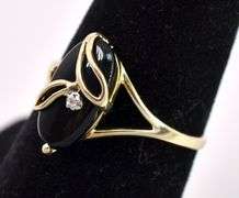 Bewitching Black Onyx And Diamond Ring In Yellow Gold