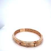14K ROSE GOLD BANGLE WITH CUBIC ZIRCONIA STONES