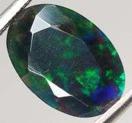 Fully faceted 1.50ct oval cut Black Opal