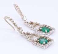 Charming White Gold oval Emerald and Diamond Dangle Earrings