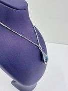 Platinum over 925 non tarnish Sterling silver with large fancy blue pendant