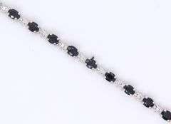 Attractive White Gold Blue Sapphire and Diamond Tennis Bracelet