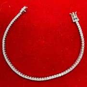 CERTIFIED BRAND NEW 14K WHITE GOLD AND DIAMOND TENNIS BRACELET. 3.30 CARATS