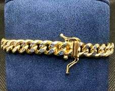 EXQUISITE 14 YELLOW GOLD CUBAN LINK BRACELET