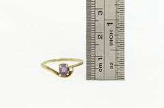 14K Yellow Gold Oval Amethyst Diamond Accent Wavy Bypass Ring