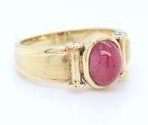 Delightful Yellow Gold Ruby Cab and Diamond Ring