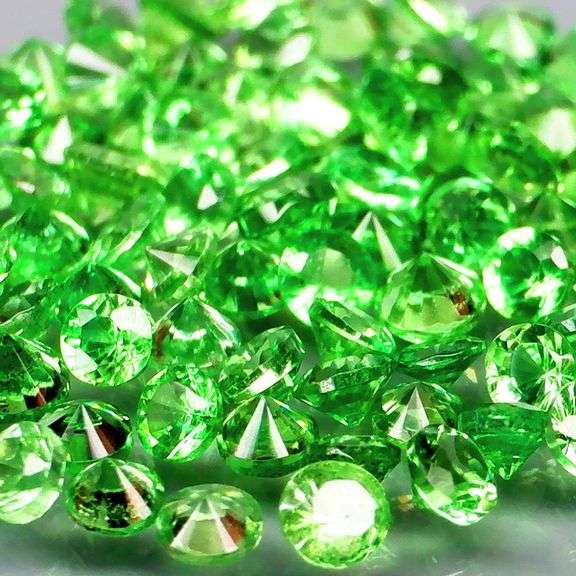 Tremendous 2.76ct untreated spring green Tsavorite set