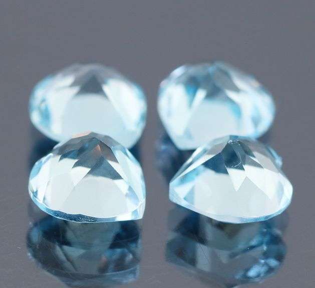 Superb quality 9.49ct 4 piece sky blue Topaz set