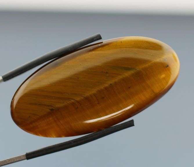 Unique! 51.39ct Golden Tiger Eye cabochon