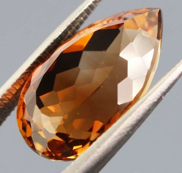 Stunning 8.76ct pear cut Imperial Topaz
