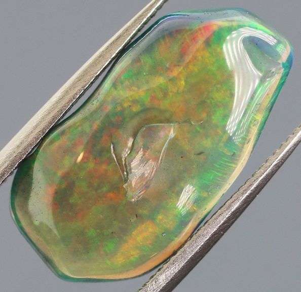 High fire collectors 3.53ct free form black Opal vein