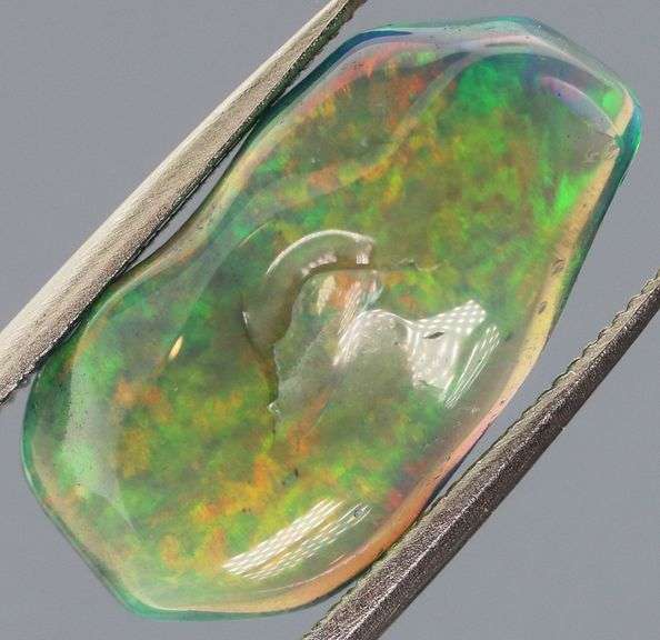 High fire collectors 3.53ct free form black Opal vein