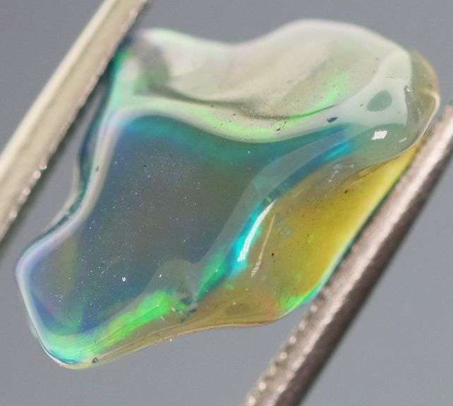High fire collectors 2.68ct free form black Opal vein