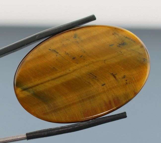 Dramatic 44.26ct Tiger Eye cabochon