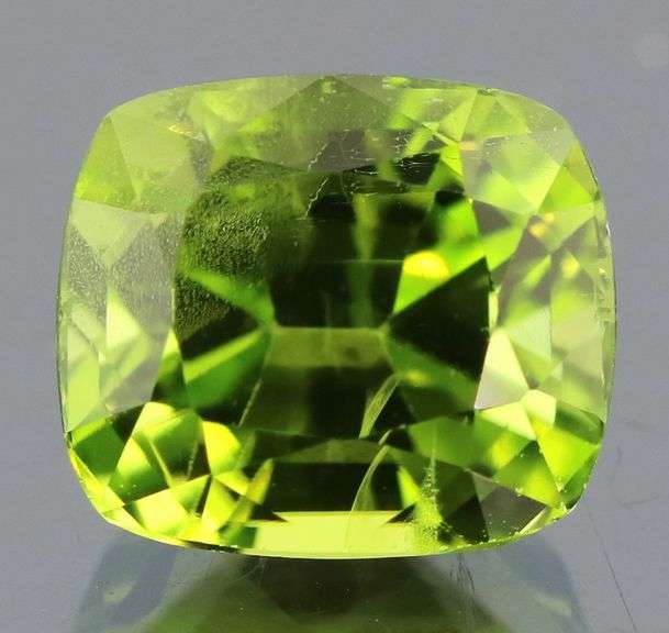 Superb 3.92ct cushion cut apple green Peridot