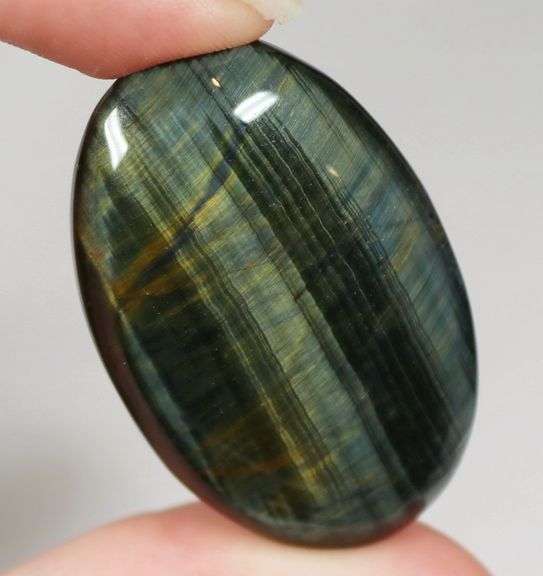 Dramatic 132ct Tiger Eye cabochon