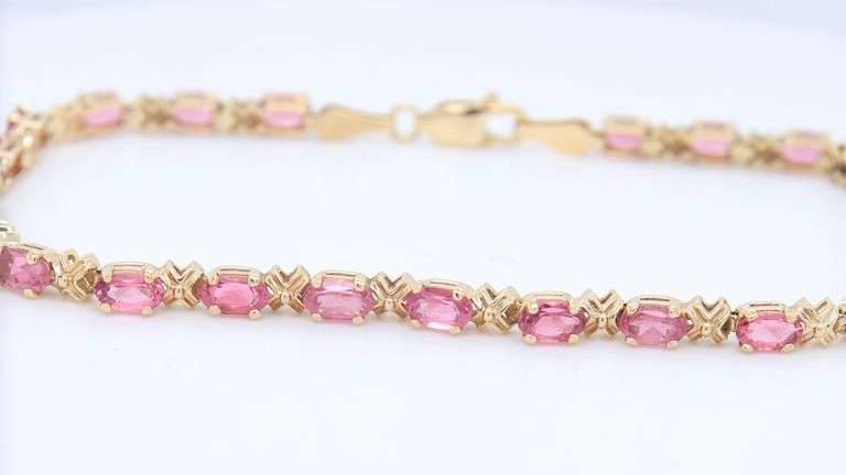 Handsome Yellow Gold oval Pink Tourmaline XO Bracelet