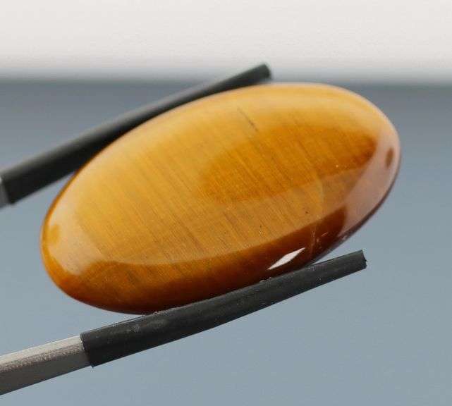 Full body shimmer! 42.58ct Golden Tiger Eye cabochon