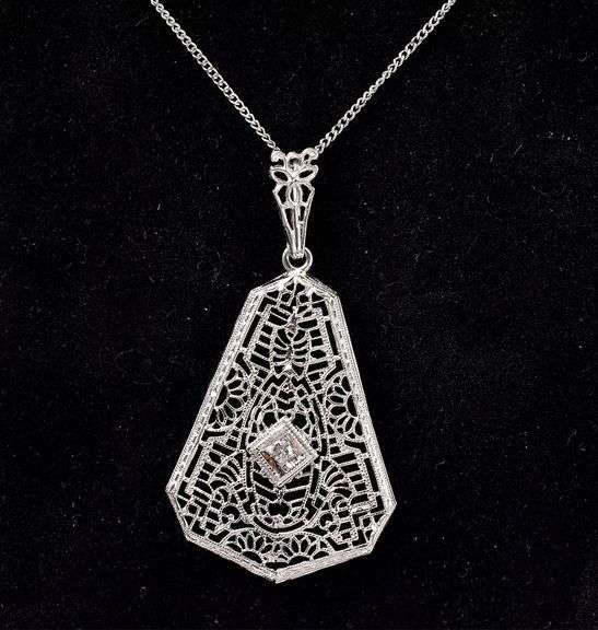 Interesting Diamond Pendant Necklace In 14K White Gold